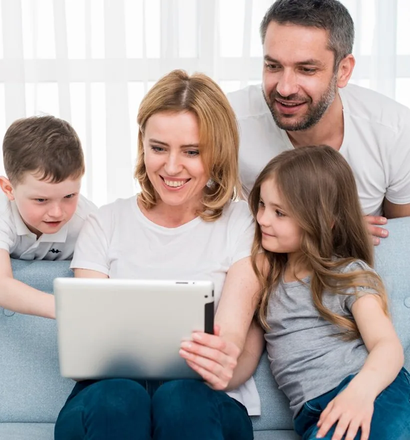 Family enjoying B Primo cable TV and internet